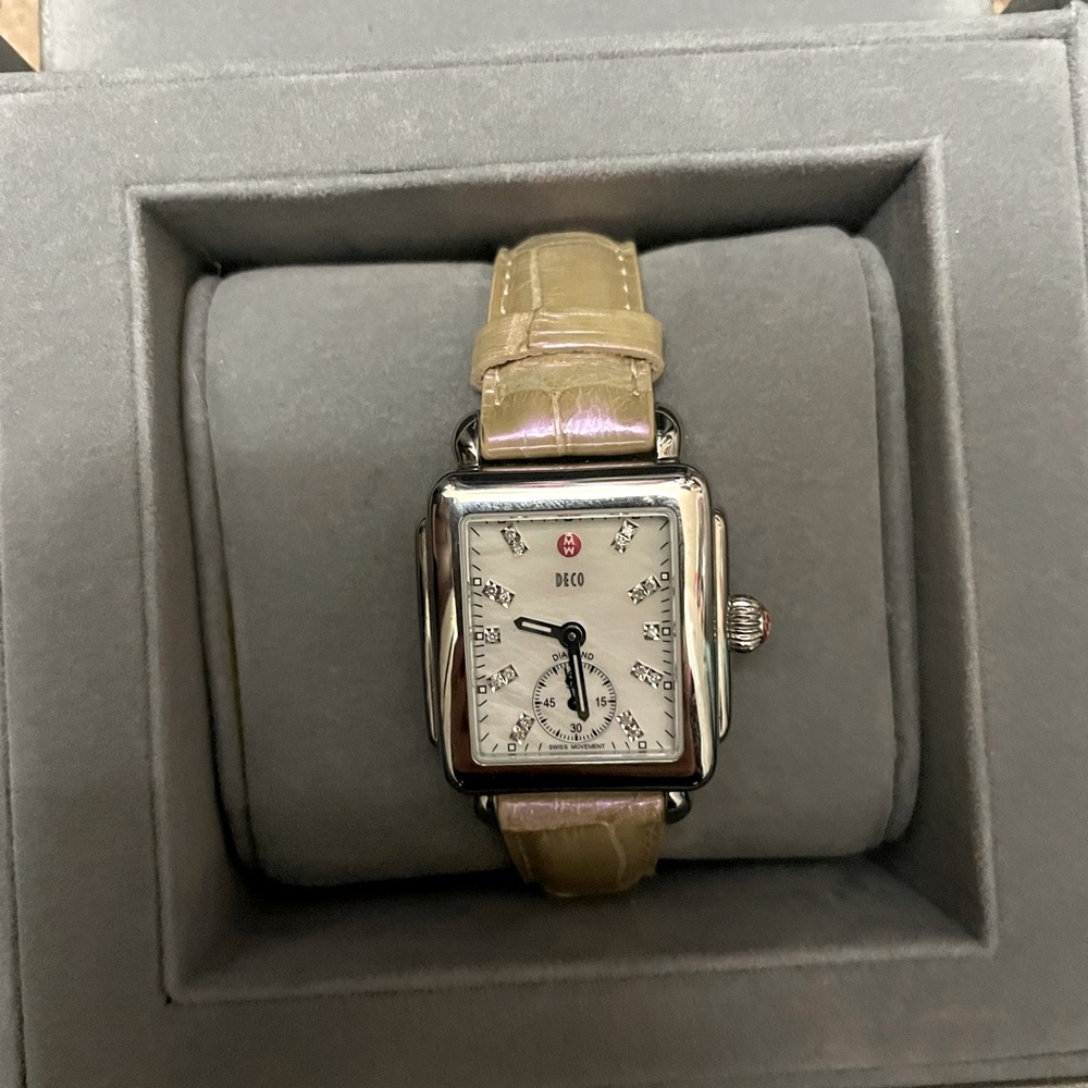 Michele Deco watch with diamond markers and mother of pearl face.